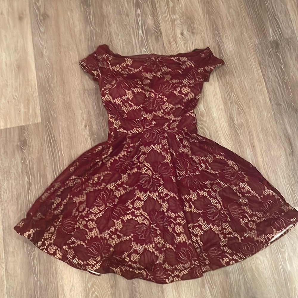 B. Darlin burgundy lace dress worn once to church lined in flesh fabric.